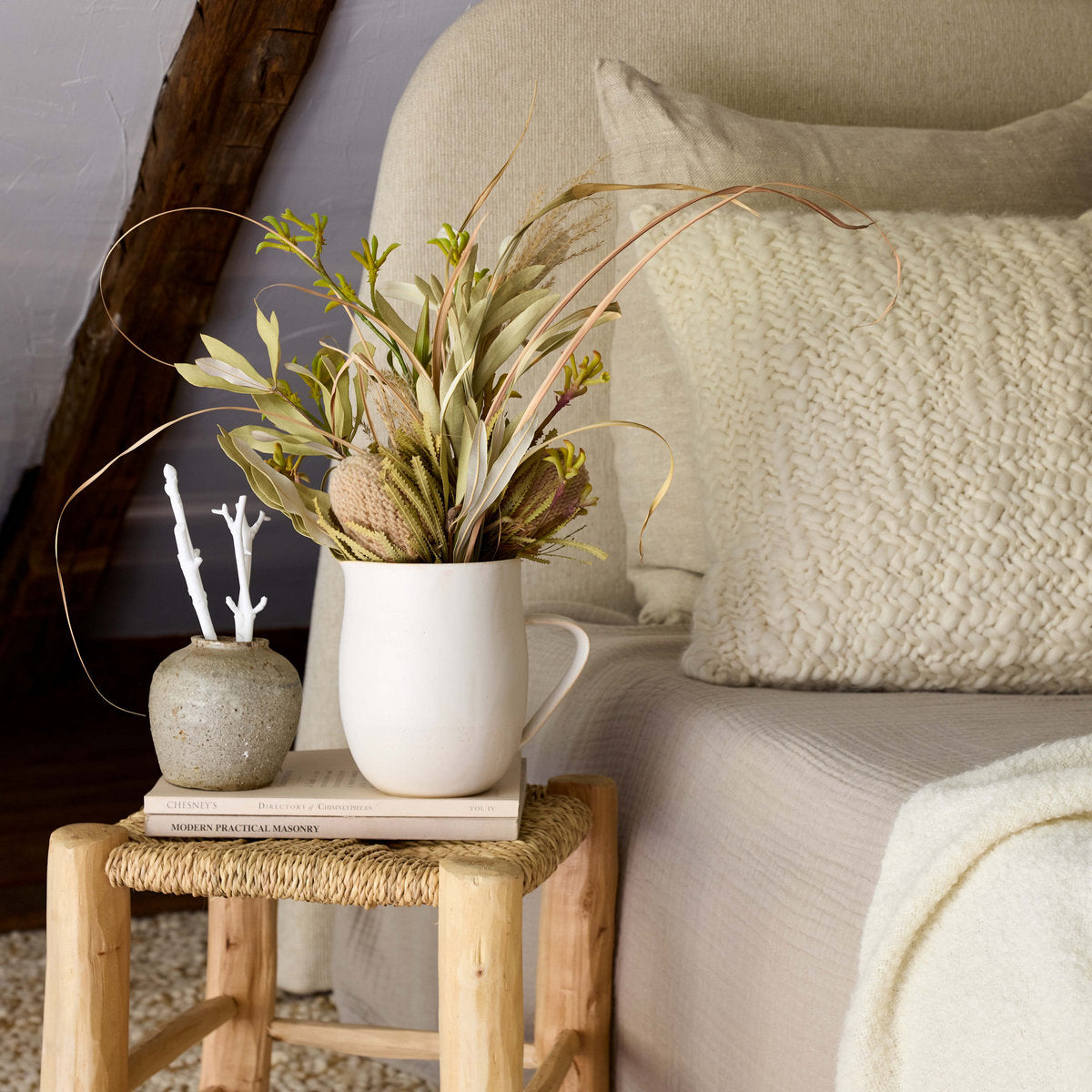 Ceramic serving pitcher in white glaze, food-safe and made for daily use