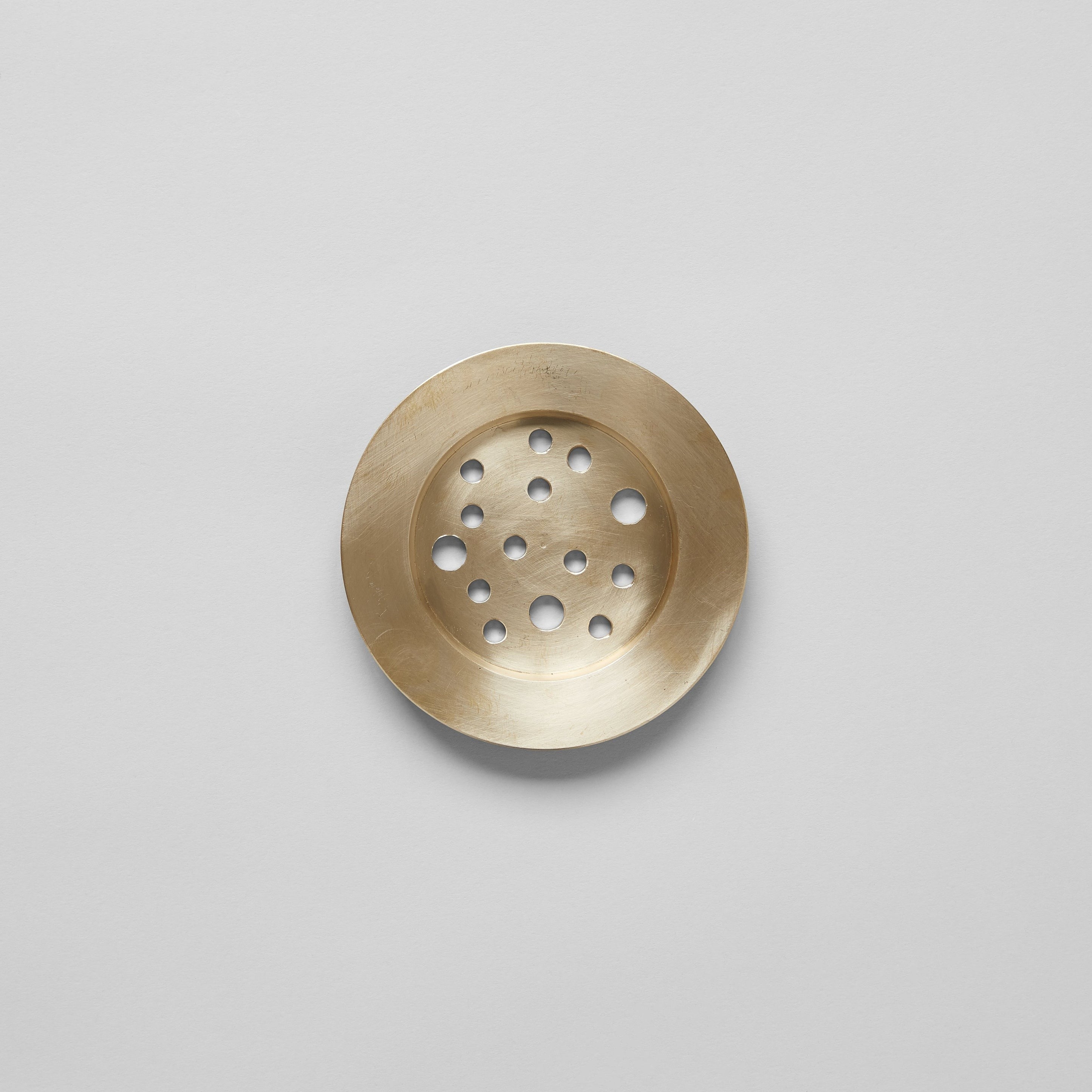 Solid brass frogs used to anchor stems in vases for mantel arrangements