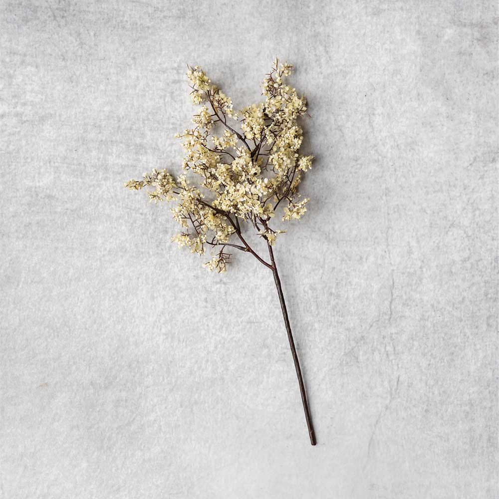 Faux Sedge, Winter Dew featuring fine dark branching stems and delicate cream blossoms on a faux botanical stem. 
