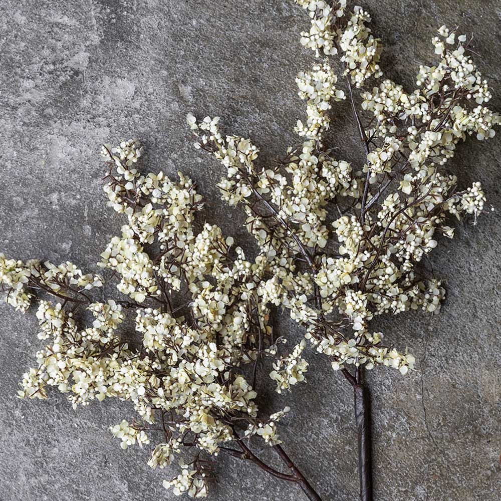 Faux Sedge, Winter Dew featuring fine dark branching stems and delicate cream blossoms on a faux botanical stem. 
