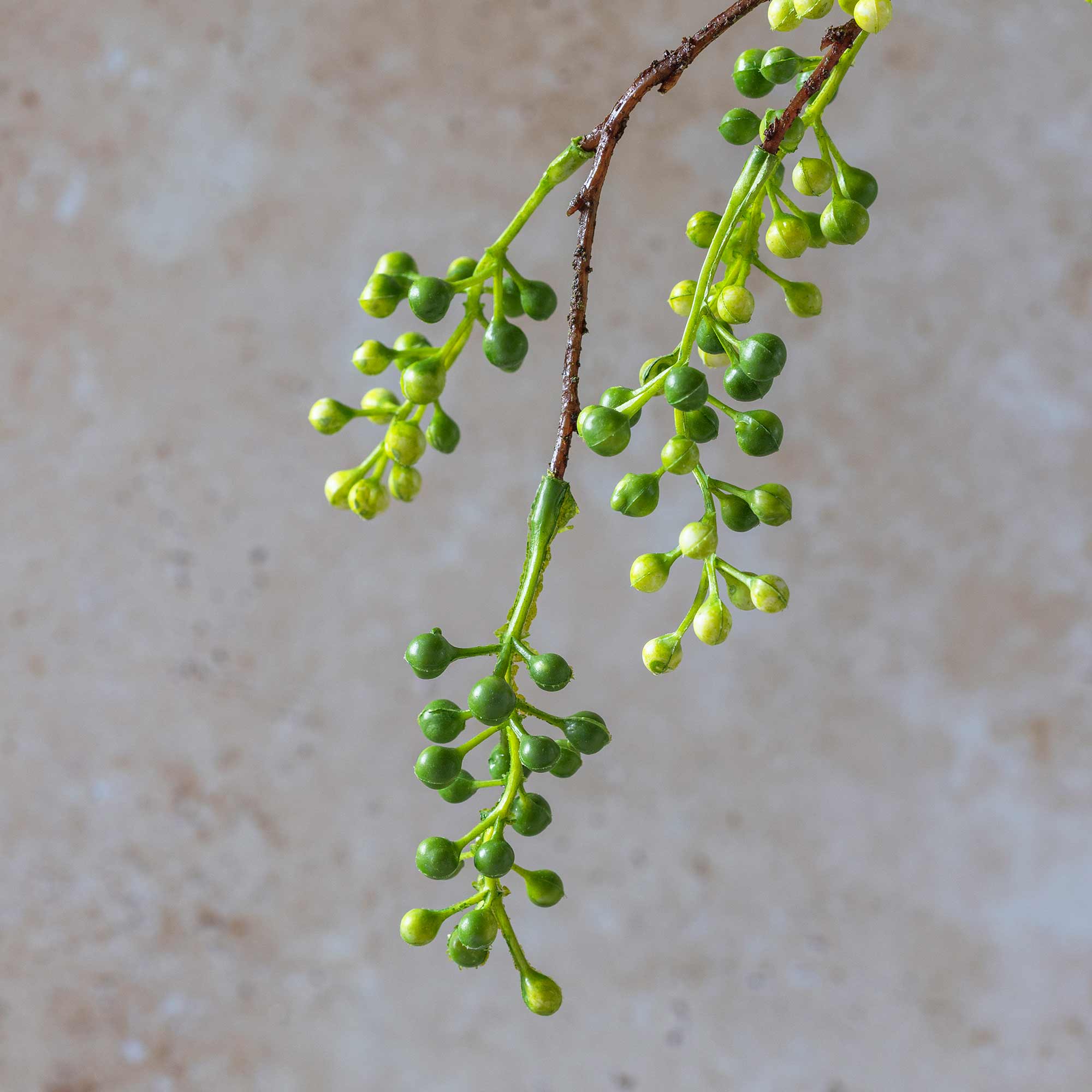 Artificial viburnum stem showing realistic berry detail