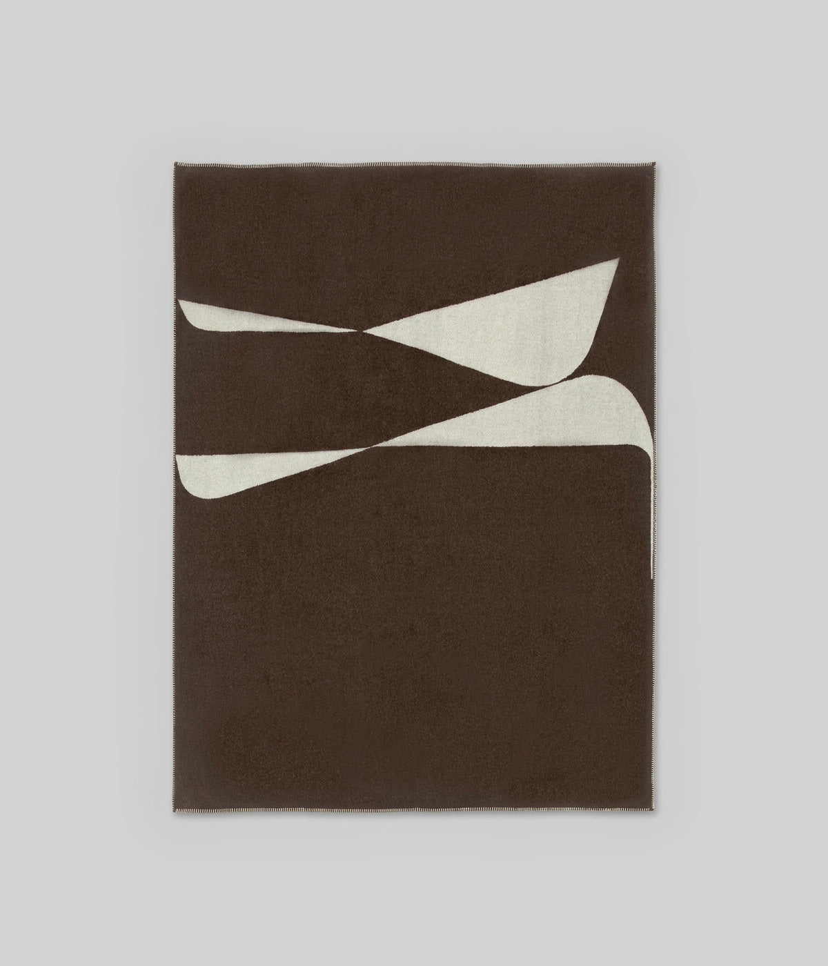 Berlin throw Ivory Coffee reverse face showing coffee ground with ivory forms