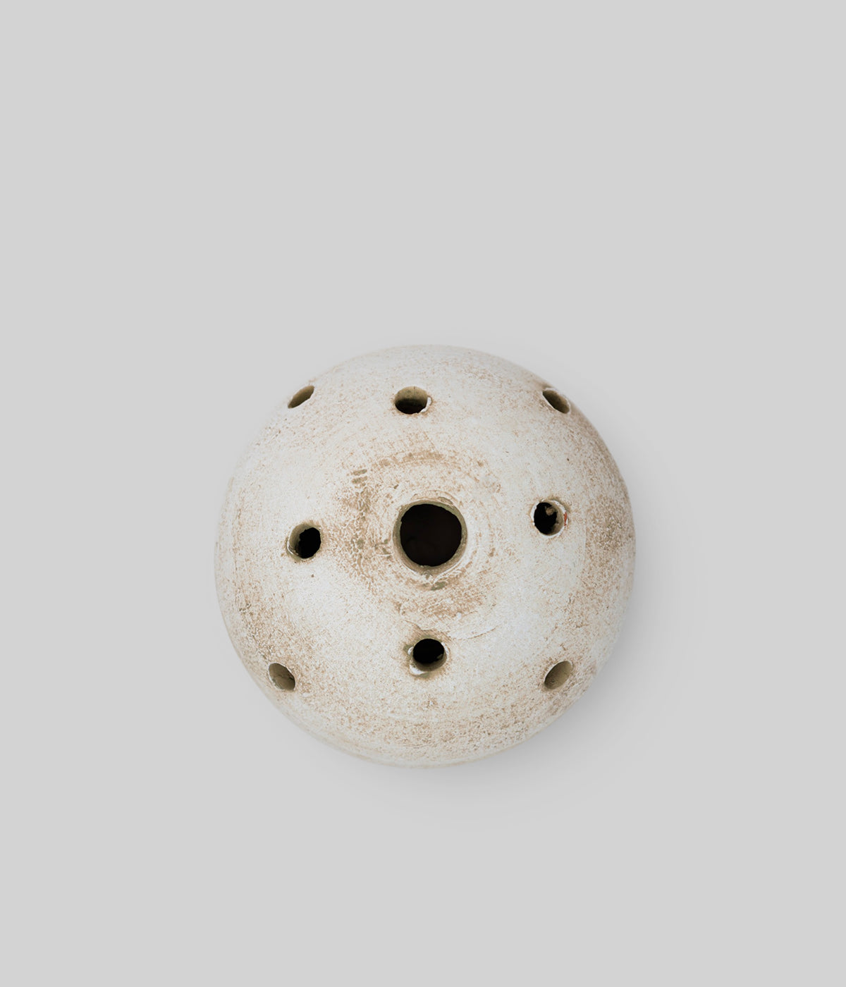 Small white terra cotta bud vase with rounded low profile