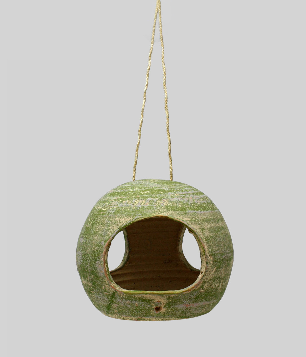 Garden Sage terracotta bird feeder suspended by jute rope