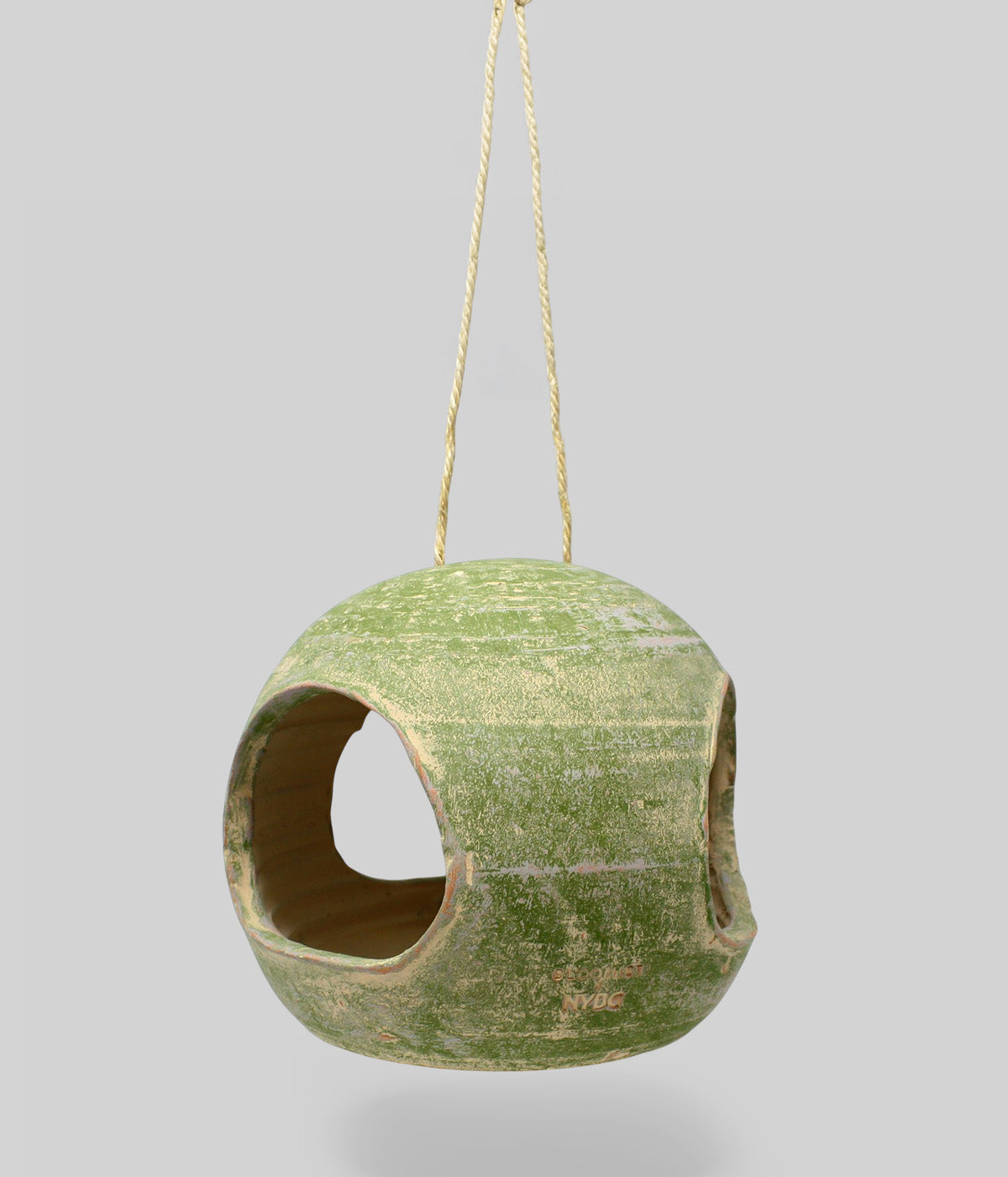 Garden Sage terracotta bird feeder suspended by jute rope
