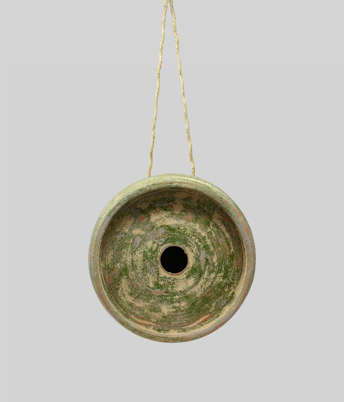 Bloomist x NYBG Garden Sage terracotta birdhouse suspended by jute rope with recessed circular front and centered entry opening