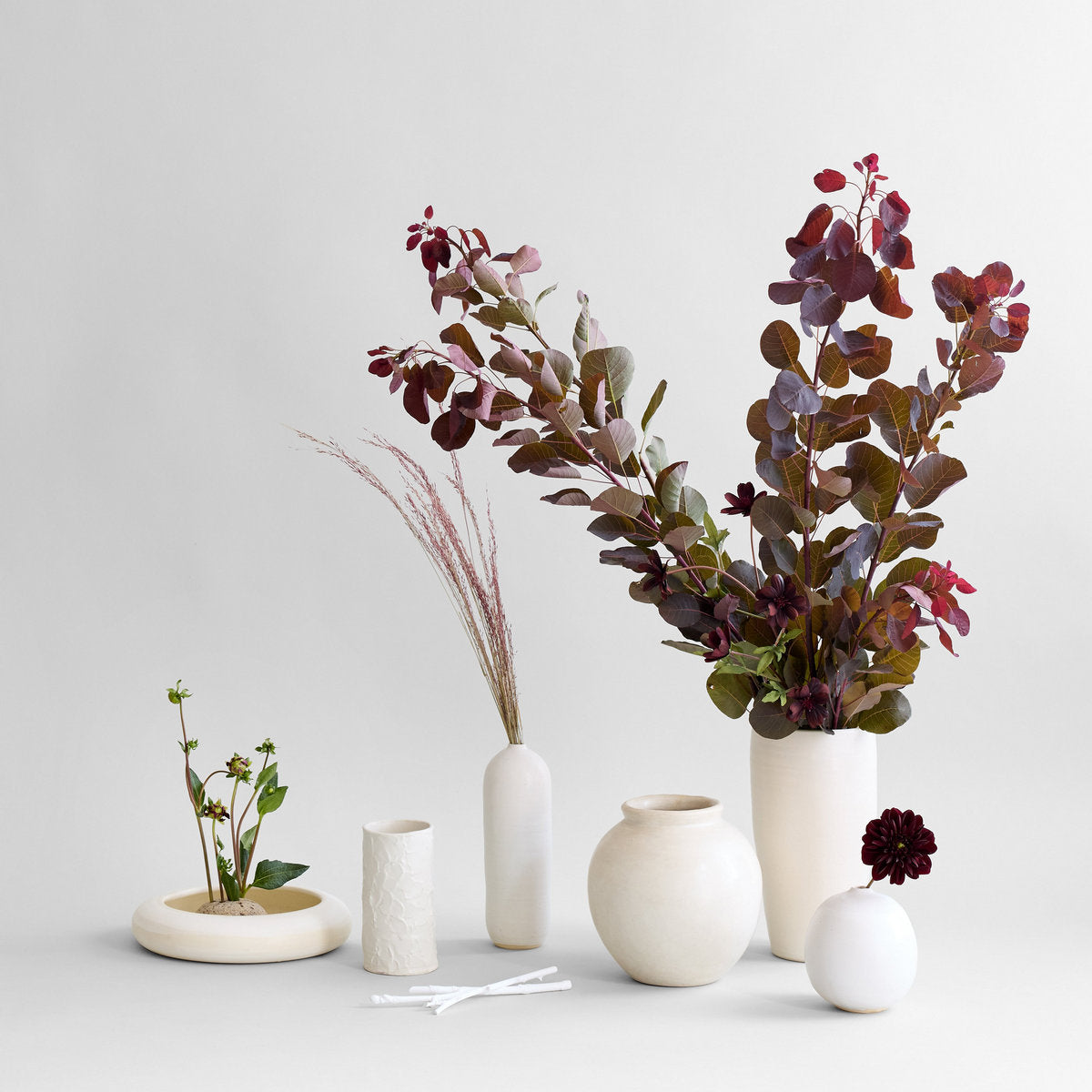 White flower vase with dimensional textured surface