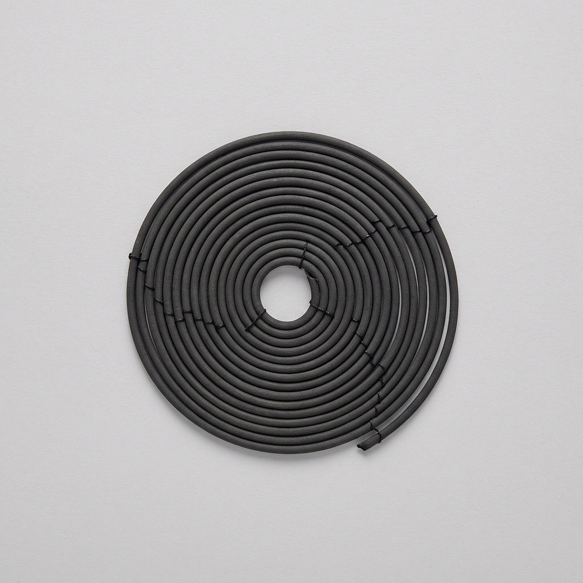 Black citronella incense coil 