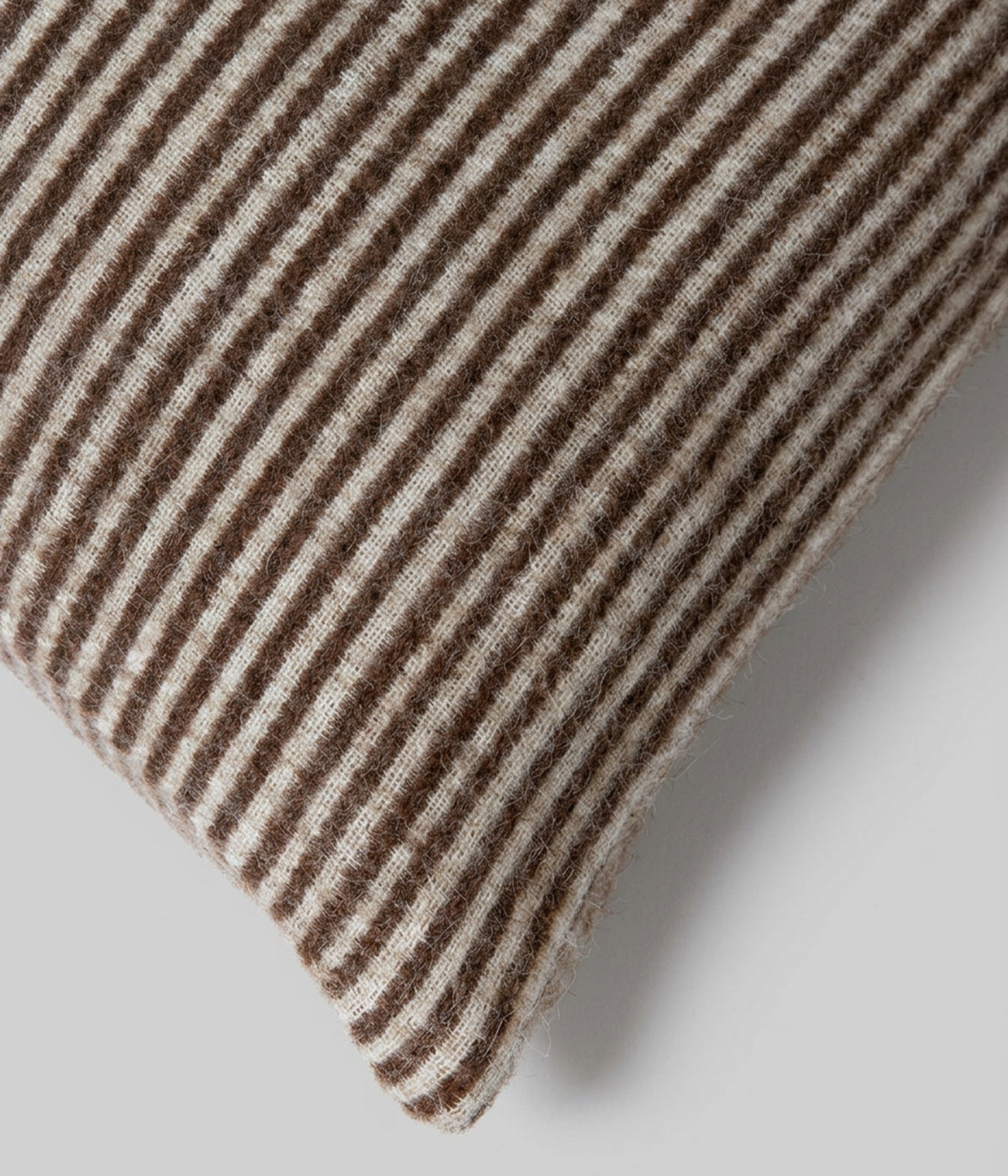 Cortez pillow micro stripe detail showing coffee and ivory alternating
