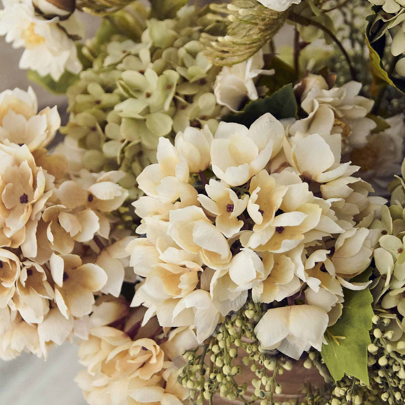 Hand finished artificial bouquet designed to replicate natural garden fresh florals