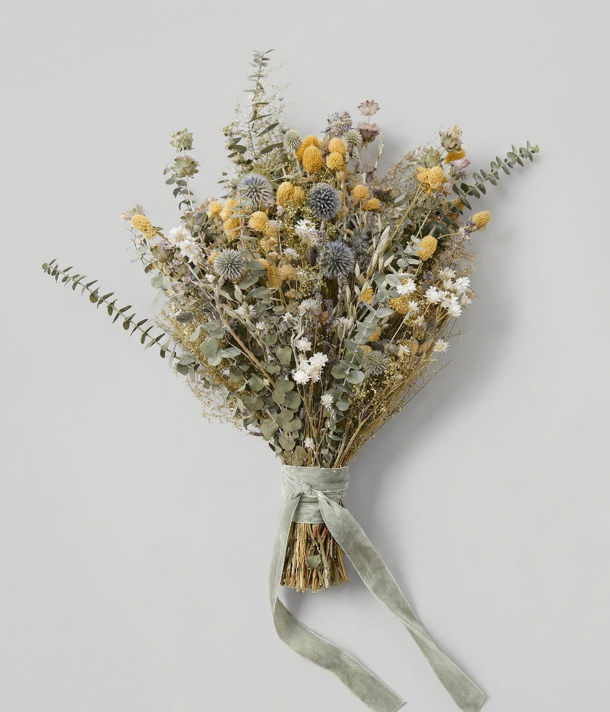 Dried green flower bouquet with eucalyptus, sweet annie, globe amaranth, and grasses