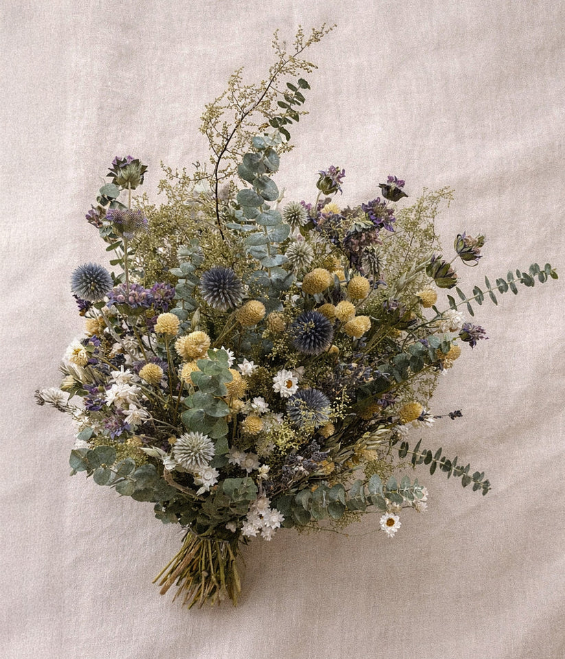 Everly spring summer flowers laid flat, showing eucalyptus, amaranth, and layered texture