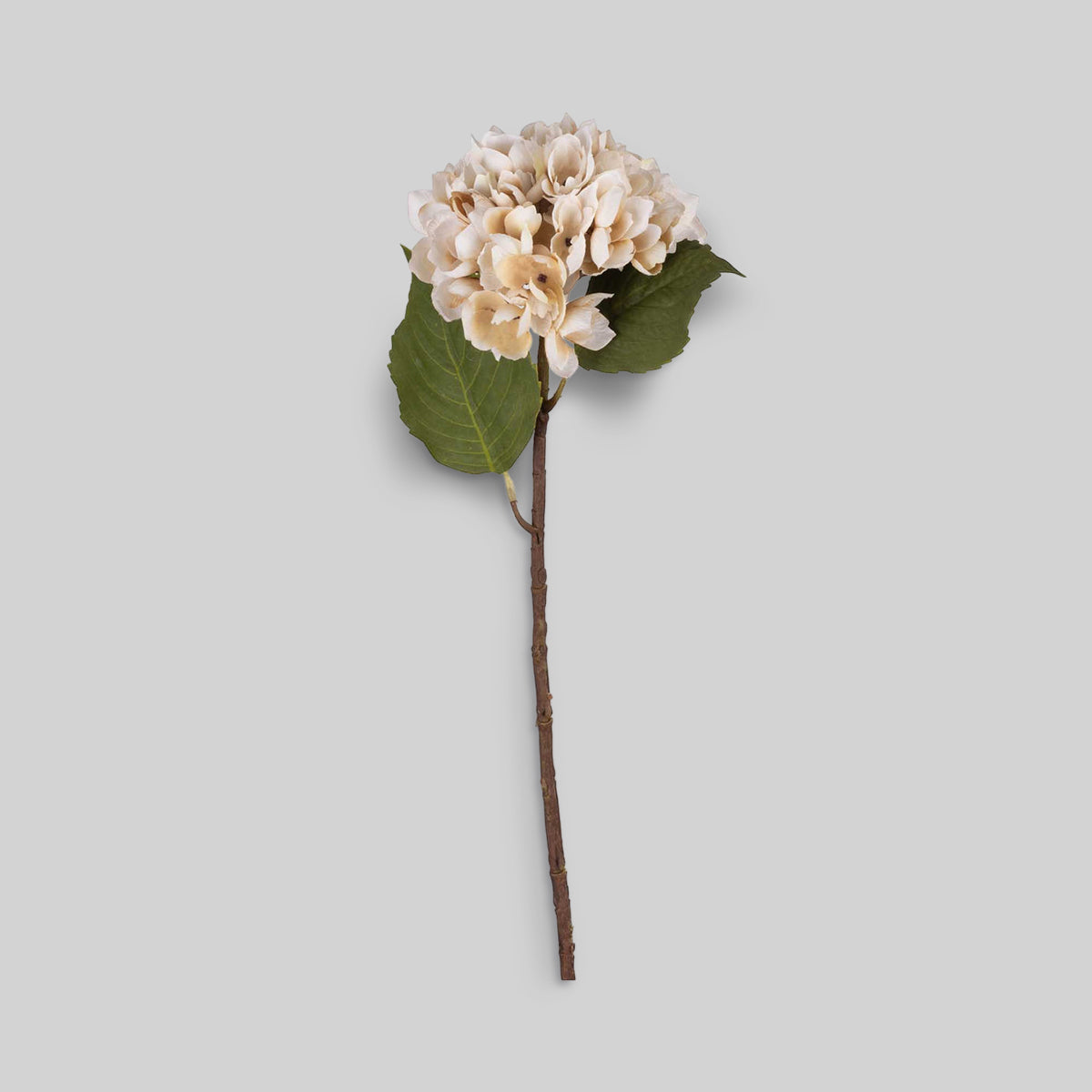 Large artificial hydrangea stem in soft champagne tones with hand-finished fabric petals