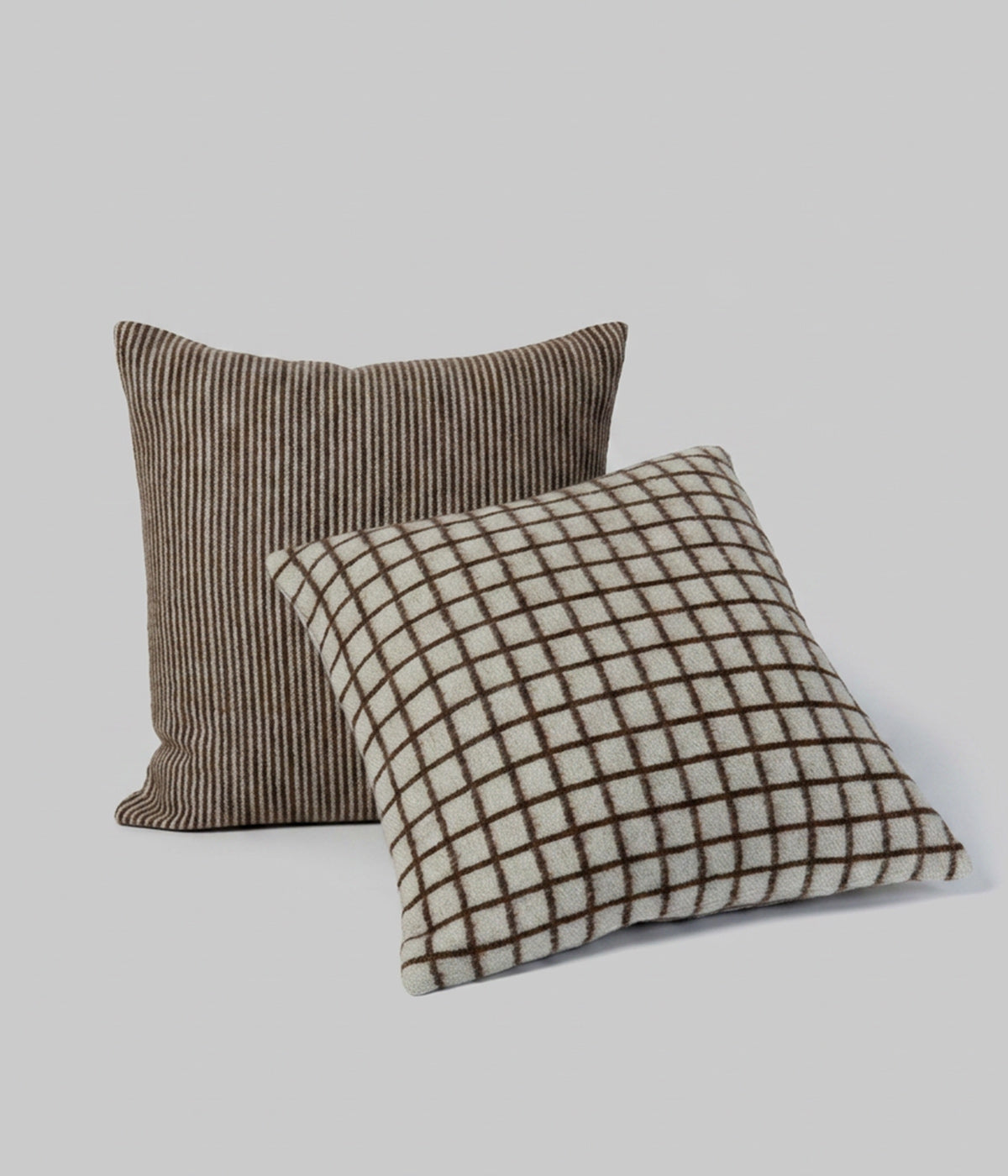 Floyd pillow micro grid detail showing fine coffee lines on ivory ground