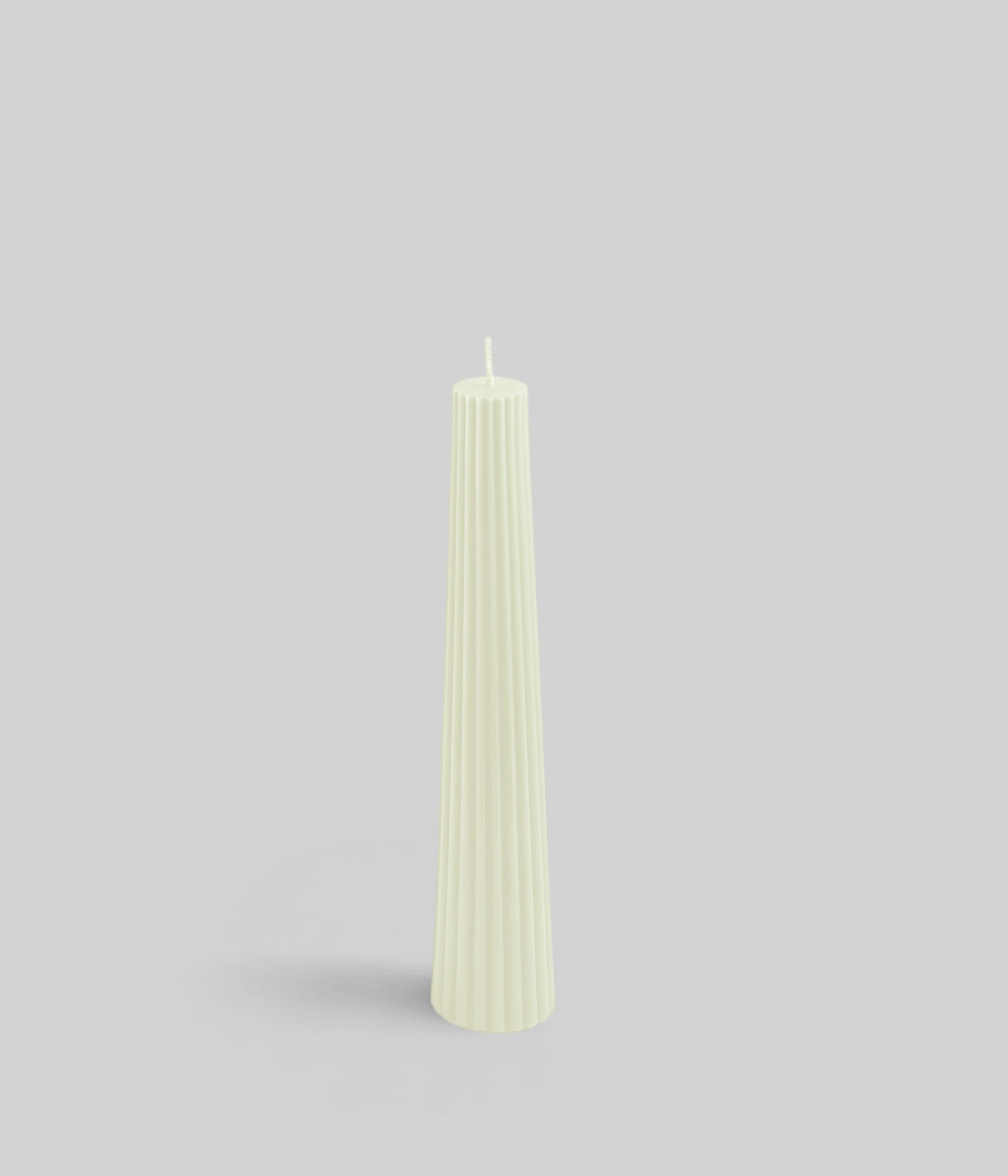 Cream beeswax pine cone candles arranged on holiday table