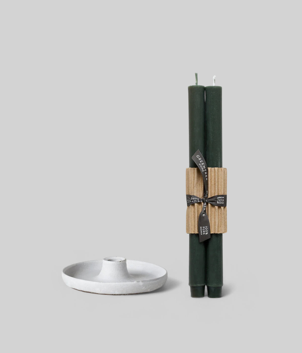 Wheel-thrown stoneware candlestick holder with tapers in antique green