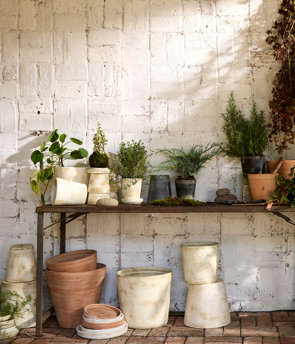Weathered grey terra cotta pots handcrafted for indoor greenery and porch plant styling