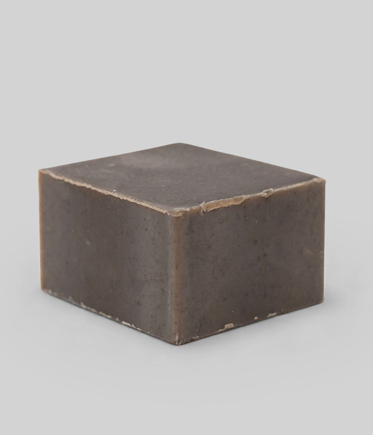 Botanical bar soap with clay-rich, mineral-dense texture