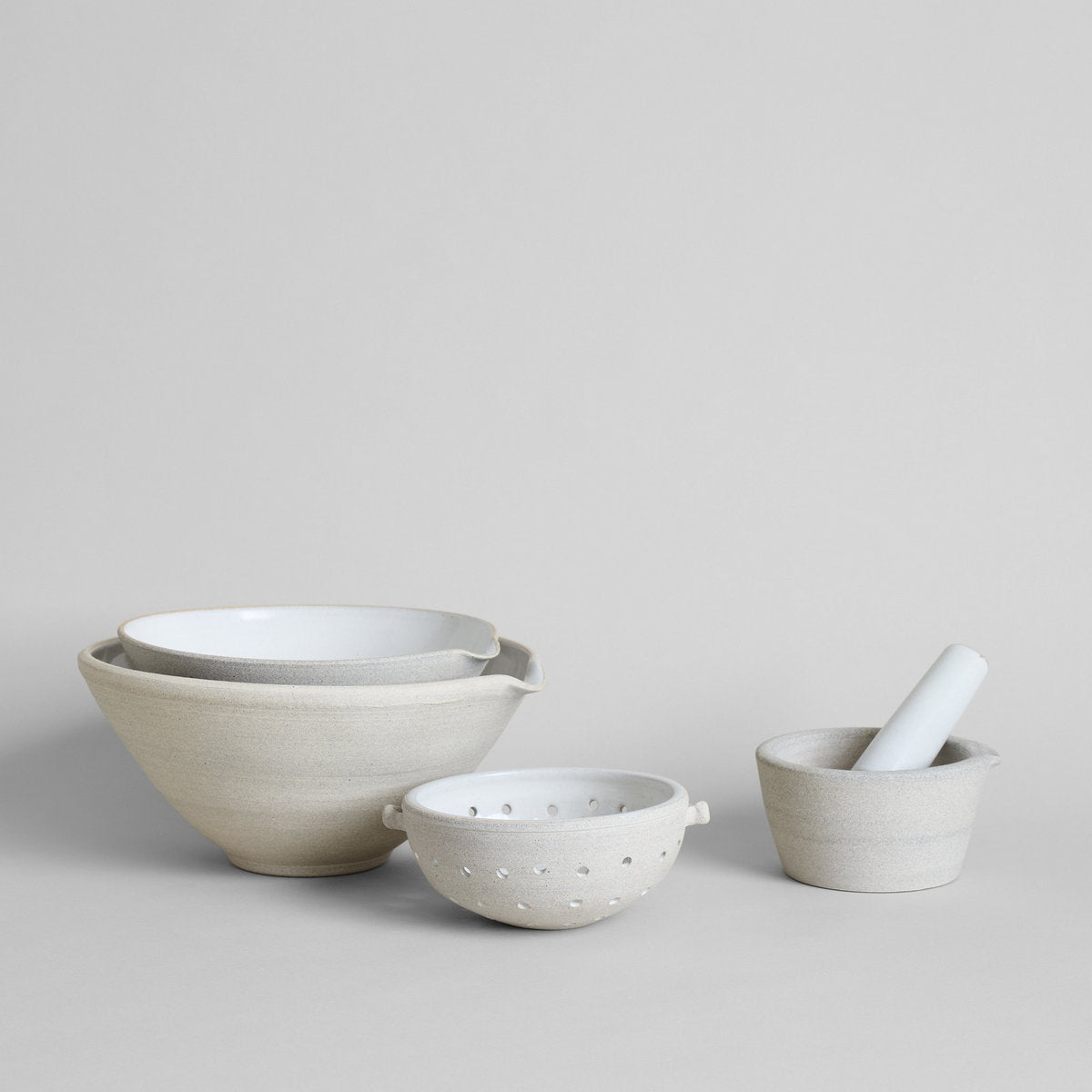 Ceramic mortar and pestle with natural speckled clay and smooth glazed finish