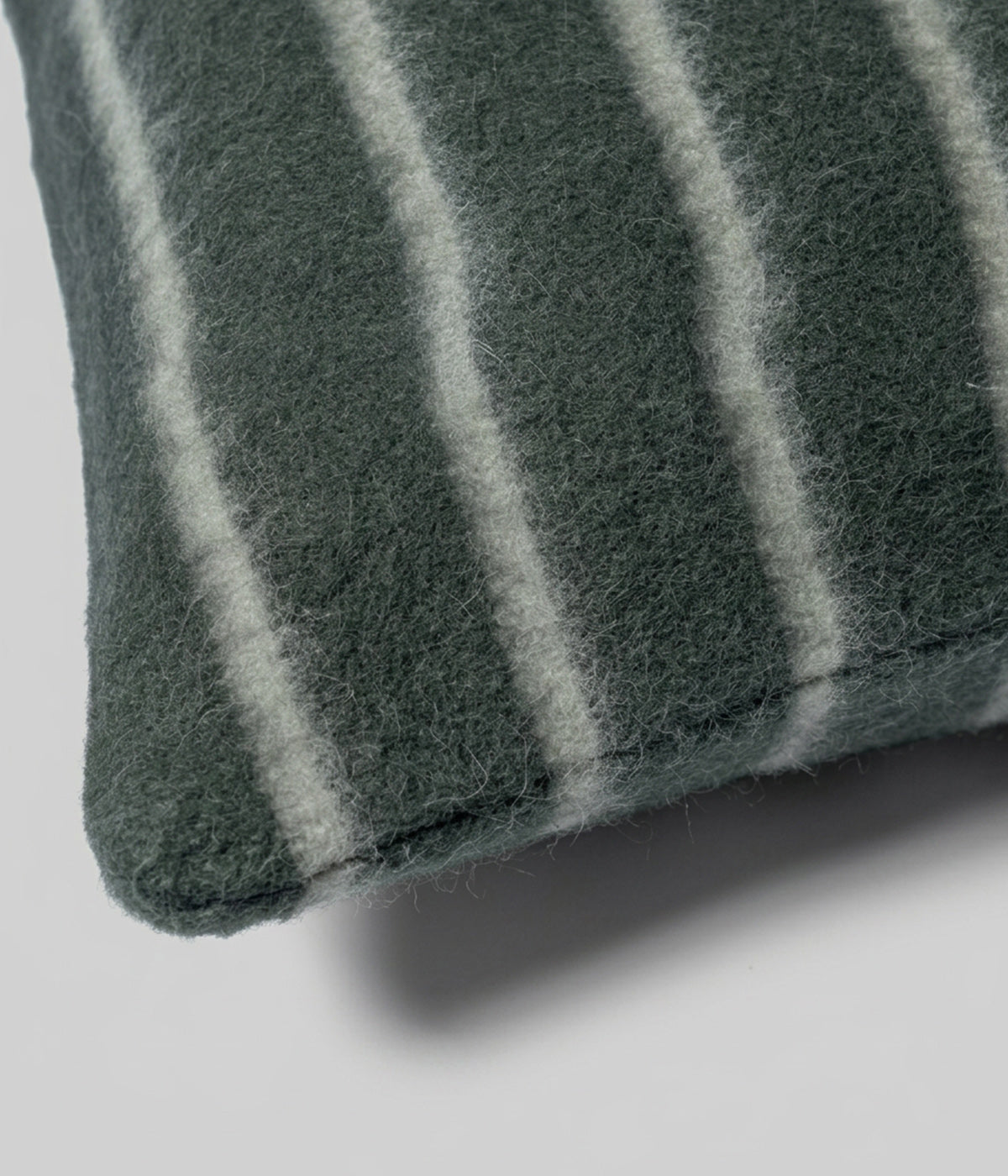 Lee long lumbar Darkest Spruce showing pale onsen stripes across full width