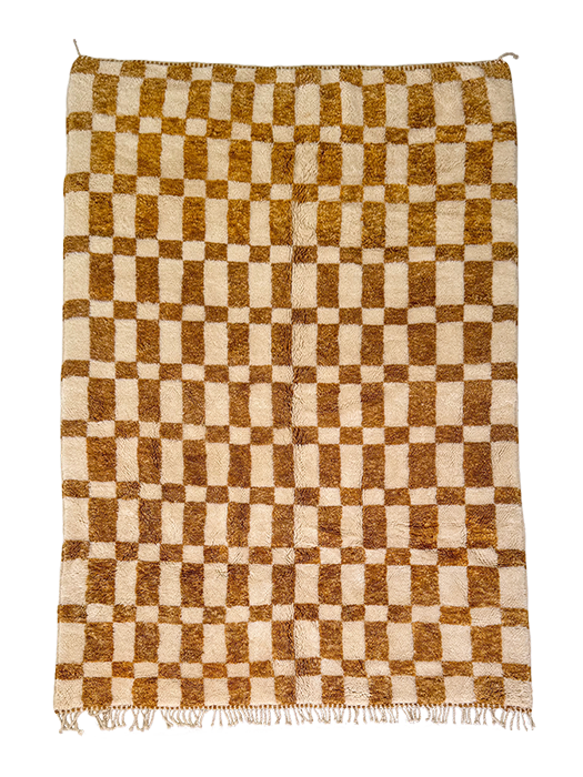 Moroccan checkered area rug in gold and ivory tones made from natural wool with soft texture