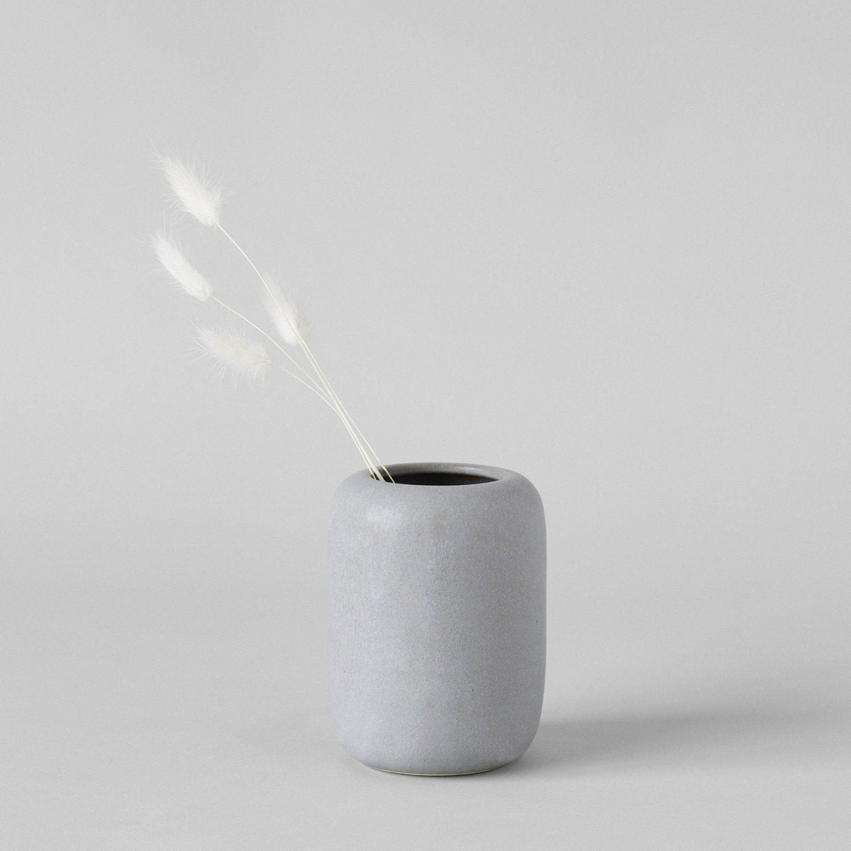 Oval flower vase with smooth, even surface and soft tone