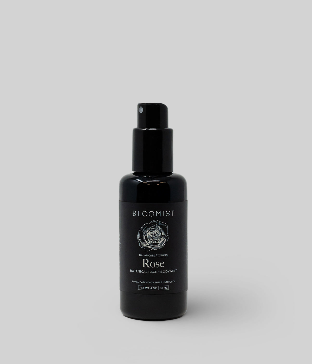 Organic Rose Hydrosol for face and body in a black bottle
