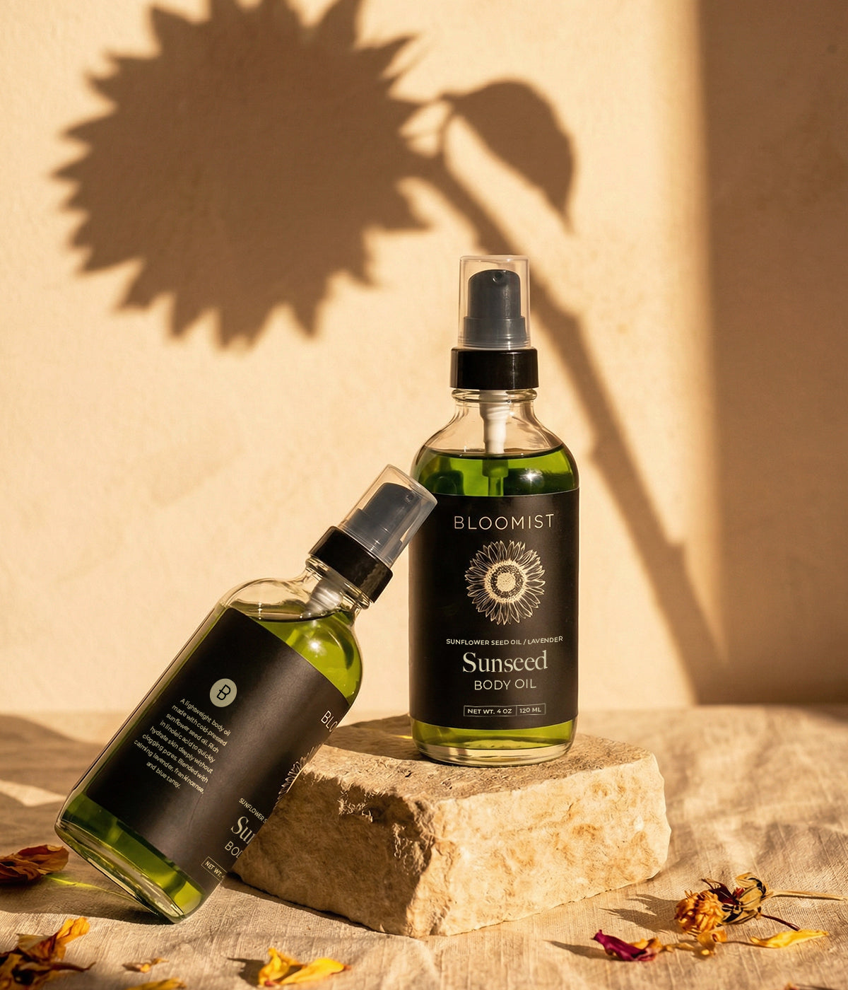 Sunseed herbal body oil bottles formulated with lavender, frankincense, and blue tansy