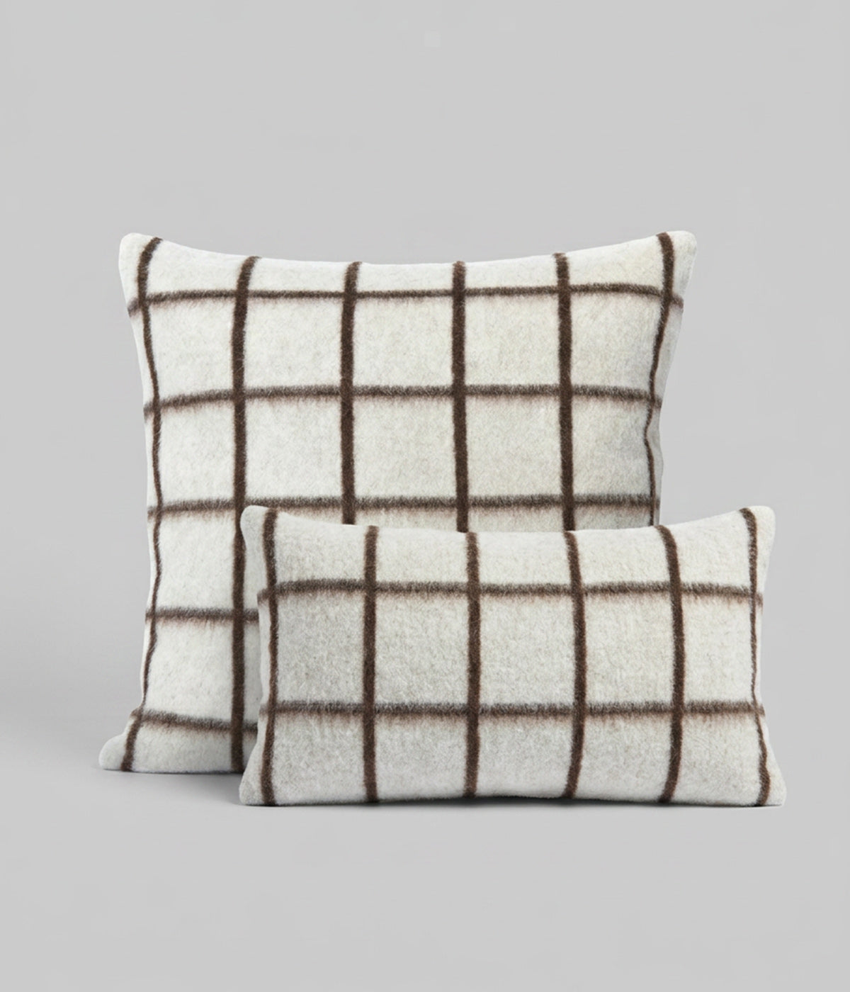 Umi suqare and lumbar pillows in coffee and ivory
