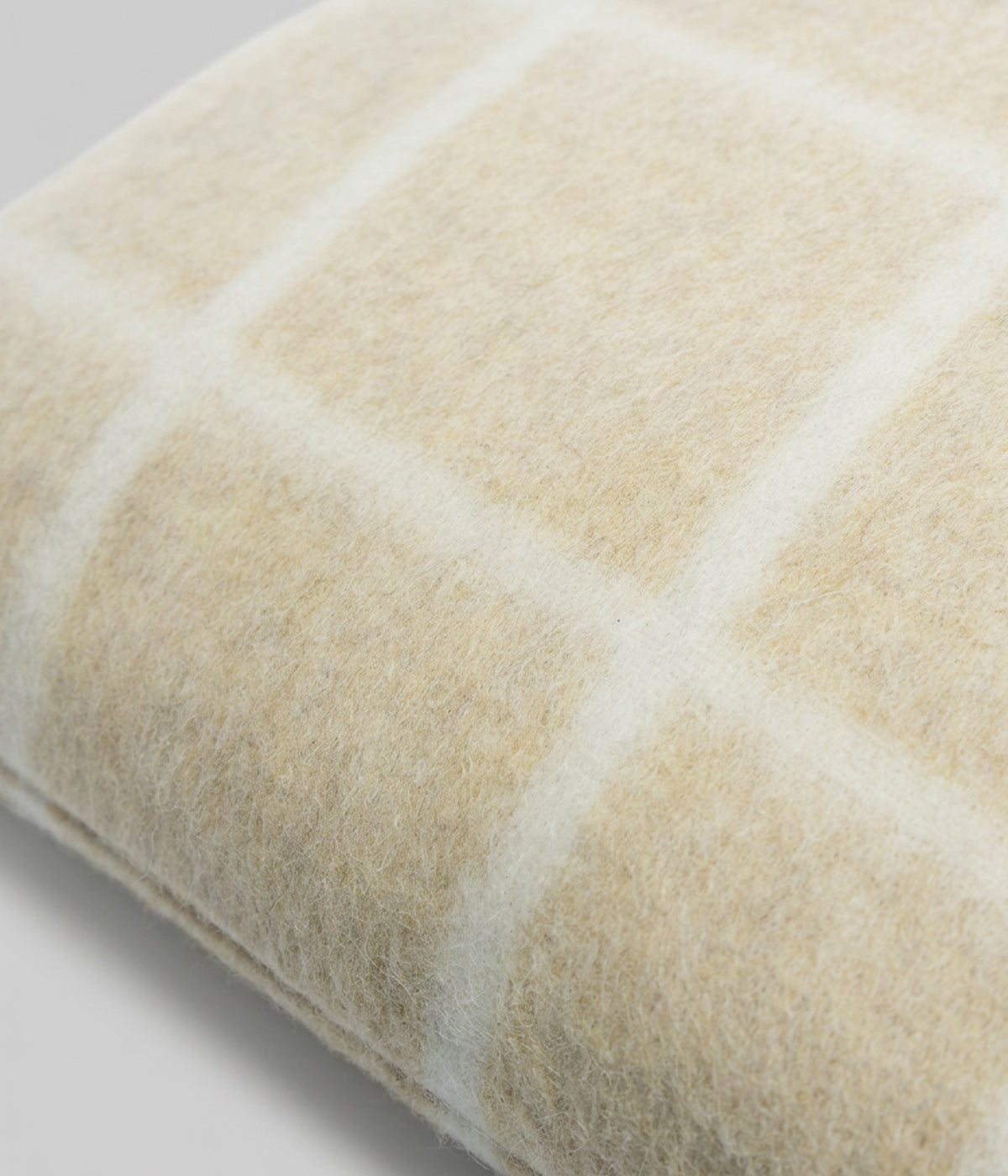 Umi large throw pillow showing brushed superfine alpaca surface