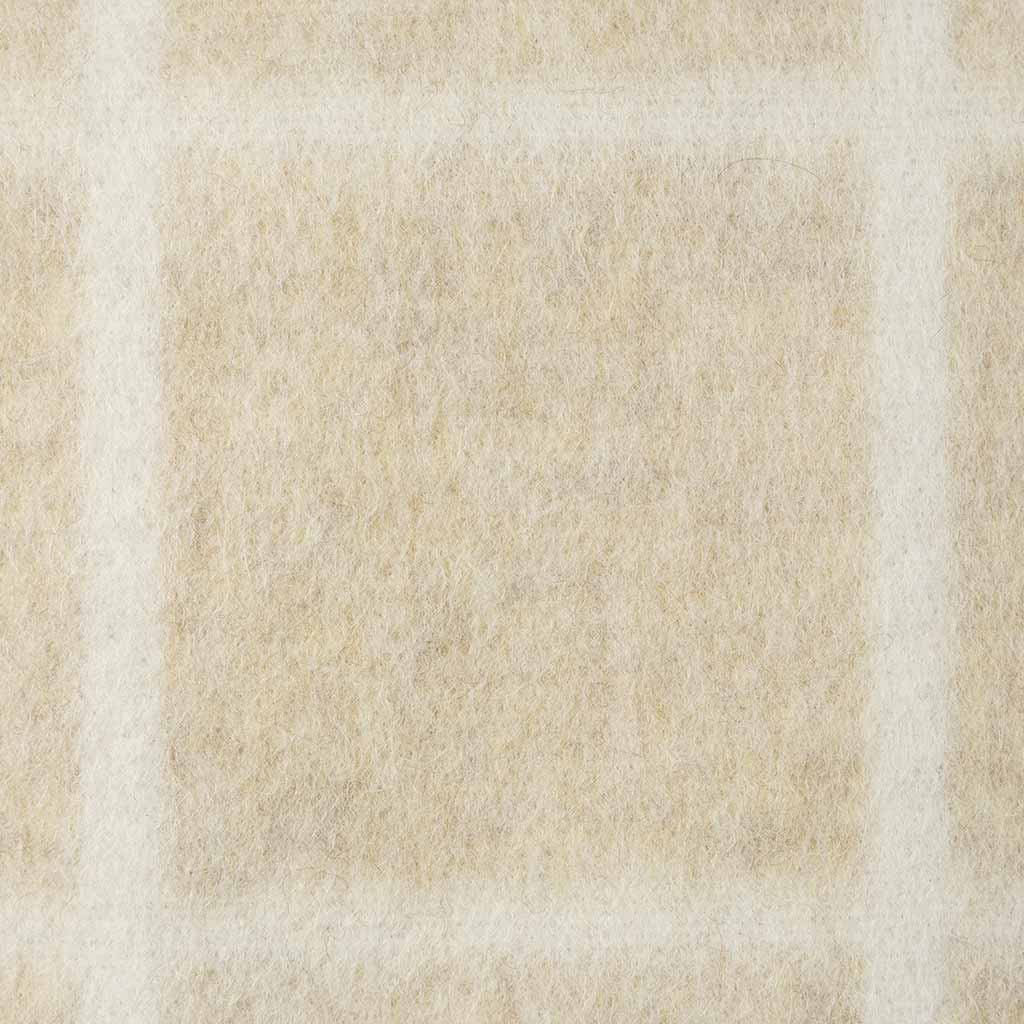 Umi square pillow close-up showing cotton keeping grid defined at this weight