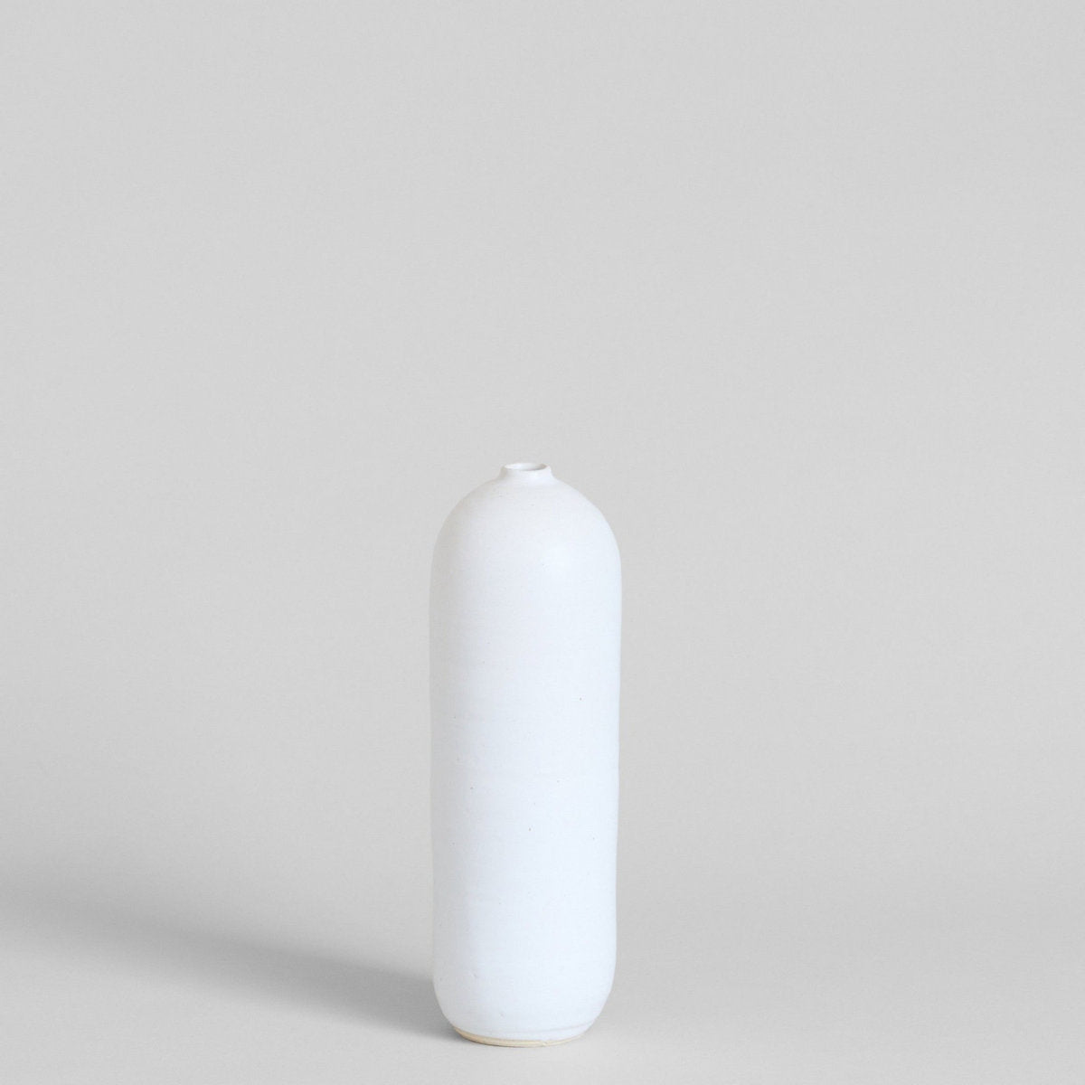White stoneware vase hand-thrown with a matte glazed finish