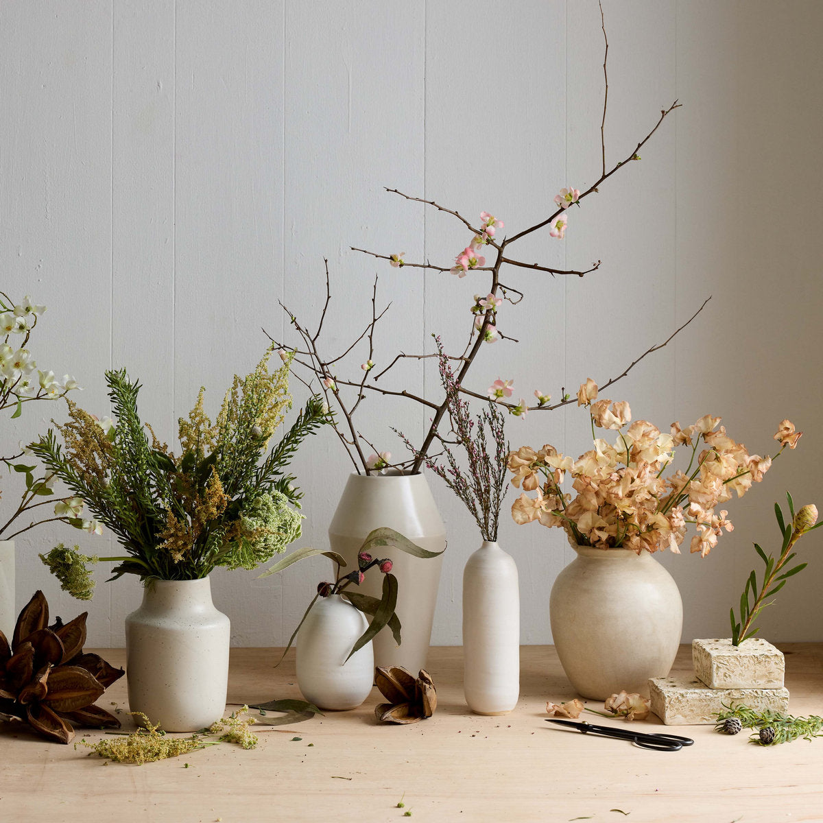 Handmade ceramic vase with narrow opening for stems and branches