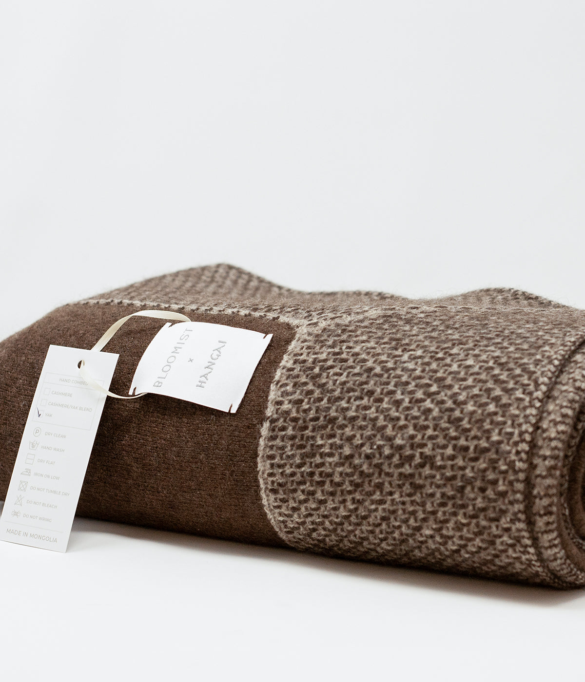 jersey knit throw blanket with Chuluu border detail for couch or bed