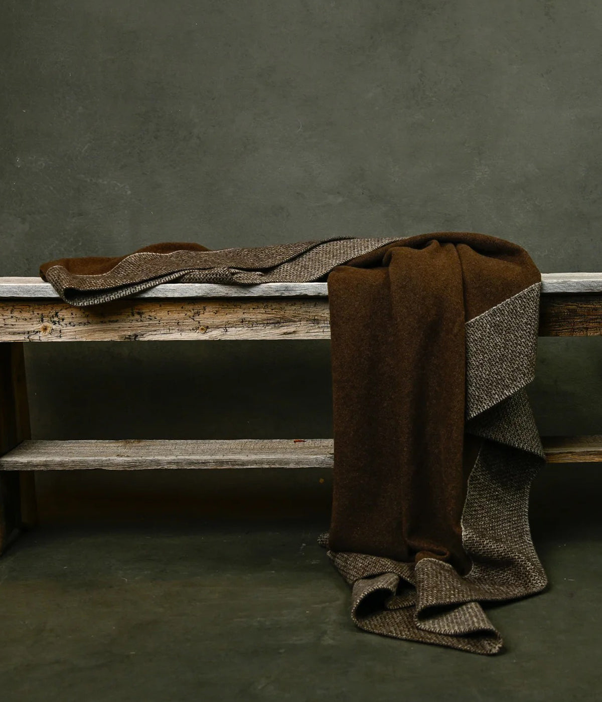 Luxurious yak down knit blanket used as a warm travel or lounge throw