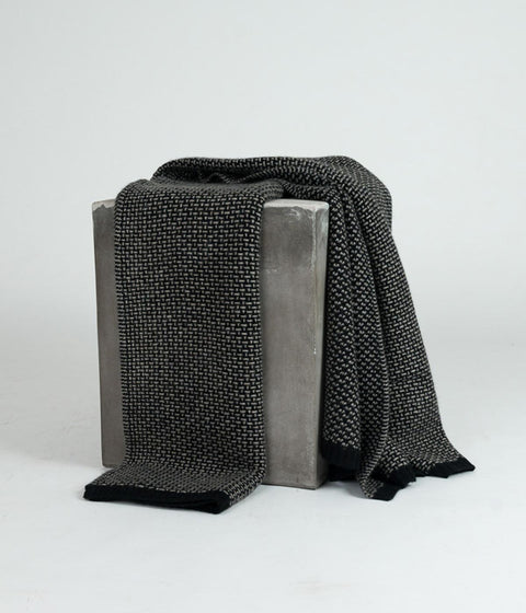 Mongolian handwoven platinum and black throw showcasing traditional craftsmanship