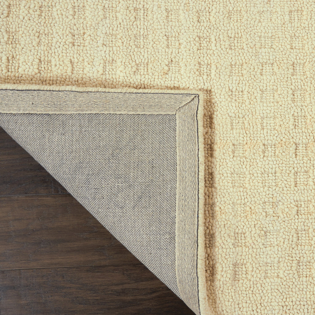 Perris Solid Ivory Area Rug