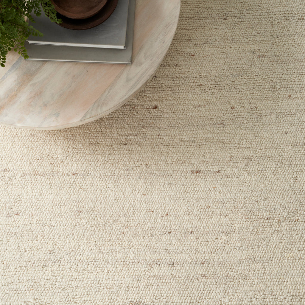 Alanna Solid Farmhouse Ivory Area Rug