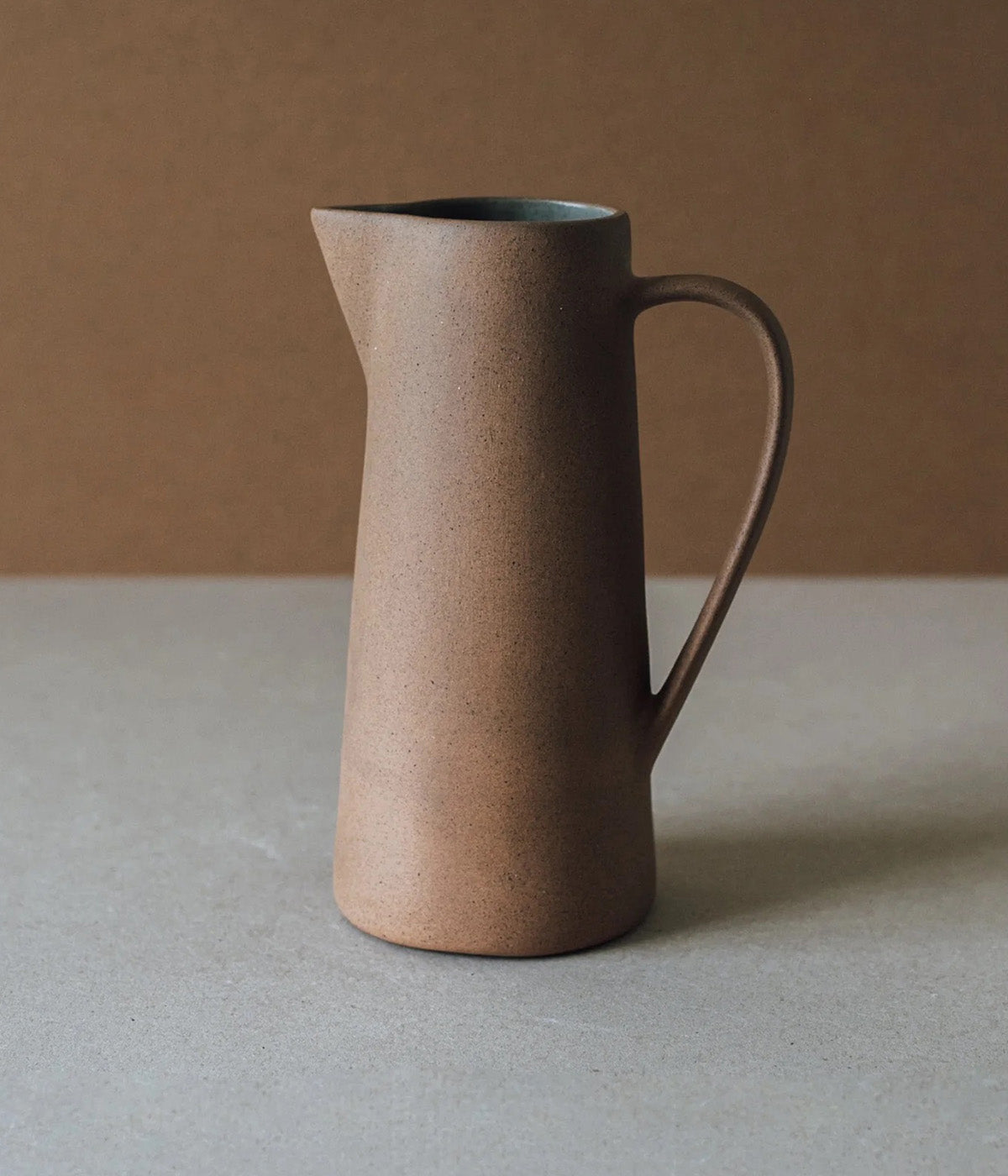 handmade ceramic pitcher handmade in Mexico for serving water or displaying stems