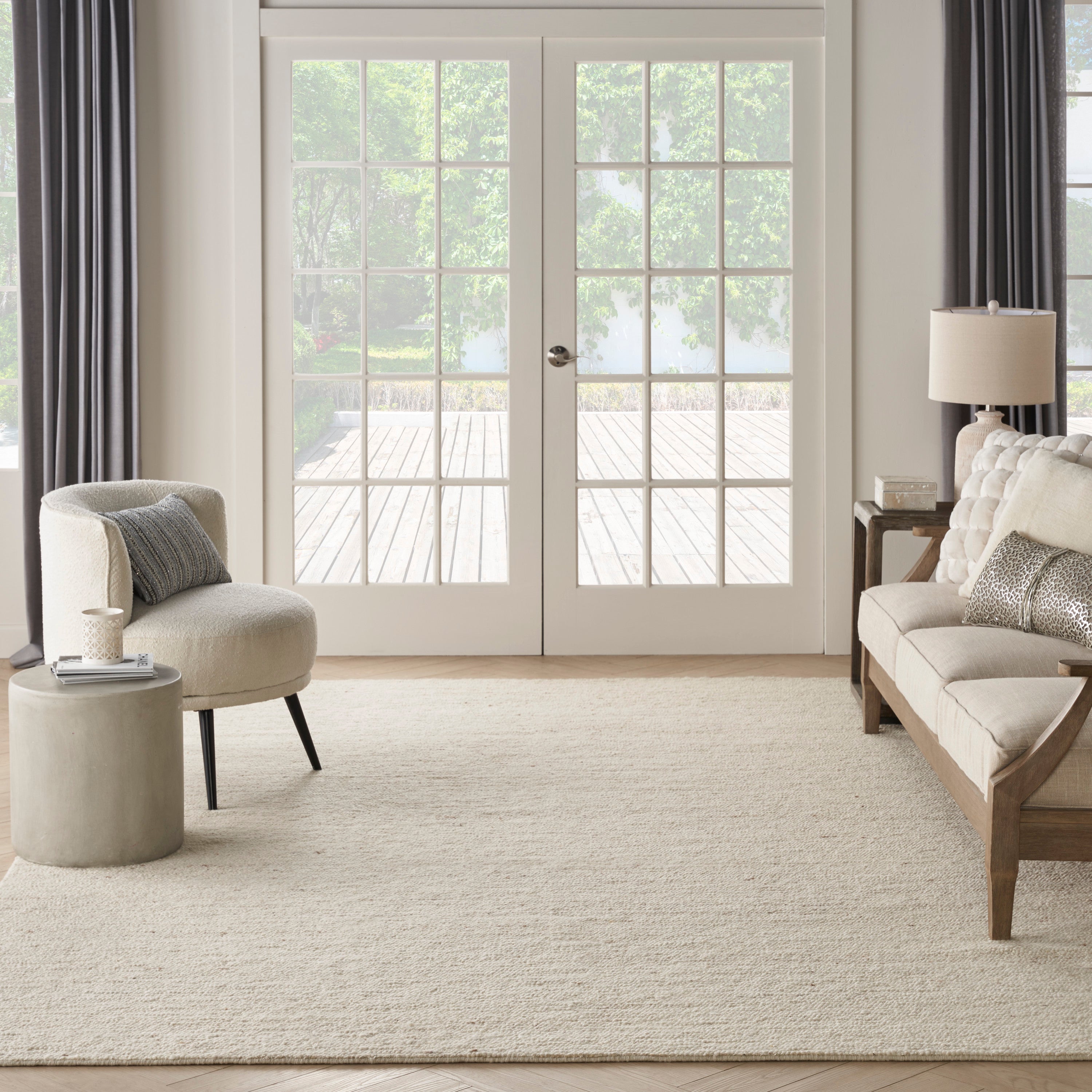 Alanna Solid Farmhouse Ivory Area Rug