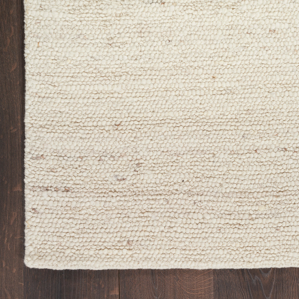 Alanna Solid Farmhouse Ivory Area Rug