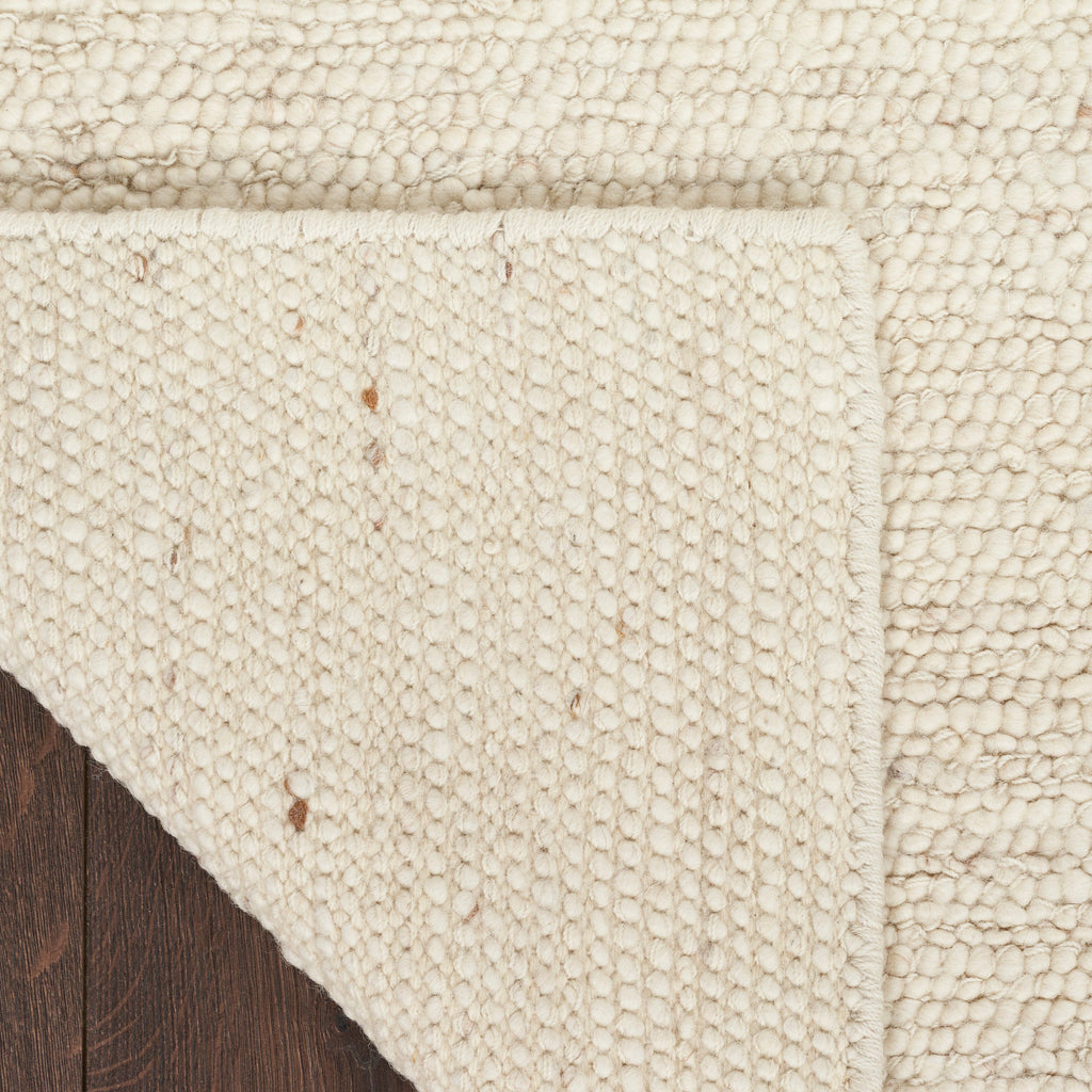 Alanna Solid Farmhouse Ivory Area Rug