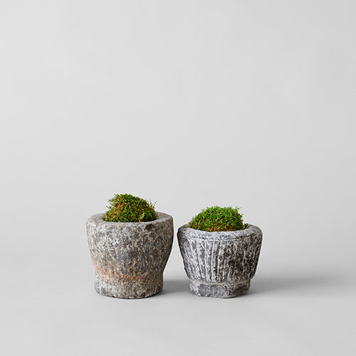 Decorative stone bowl with naturally weathered rustic patina