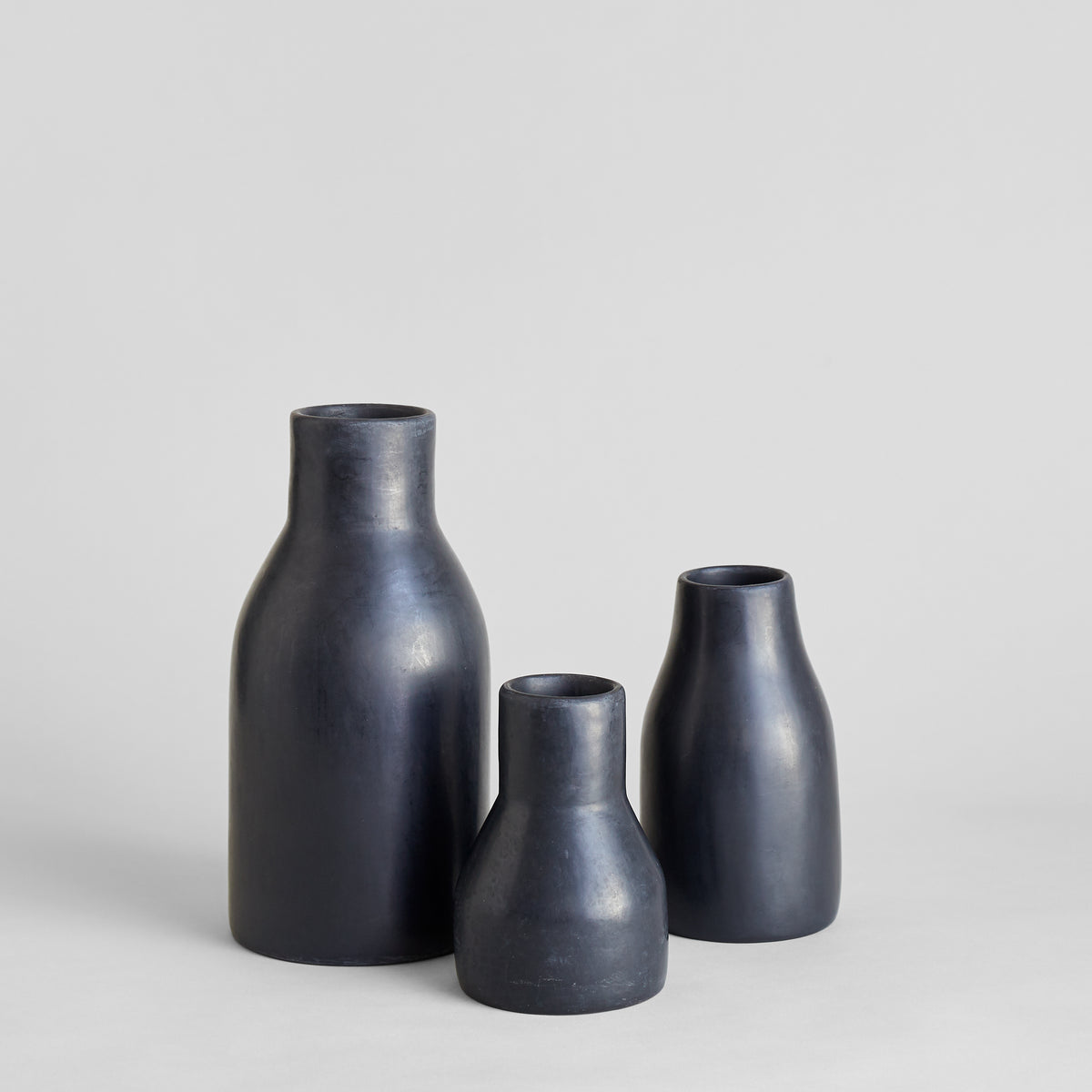 Monolithic black Moroccan vase with smooth hand-polished surface