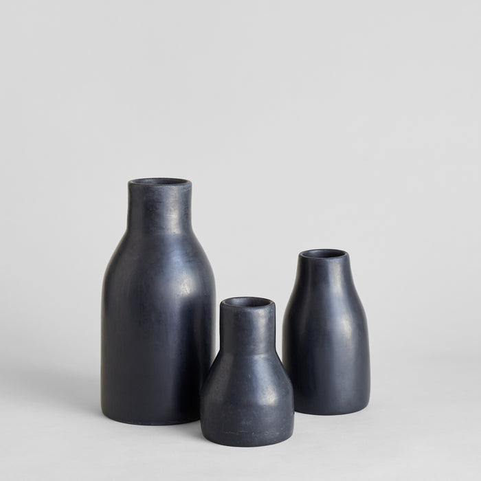 Monolithic black Moroccan vase with smooth hand-polished surface