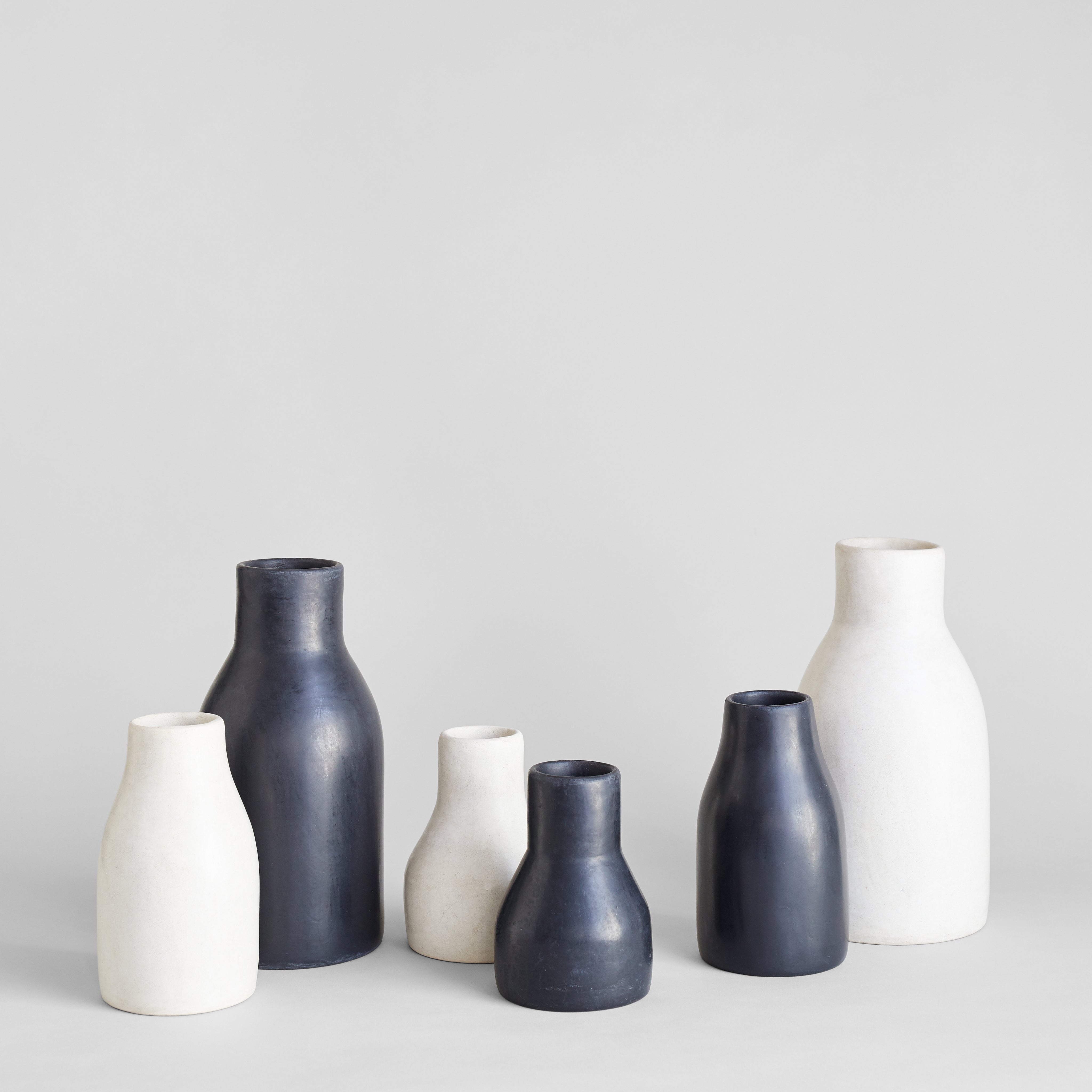 Moroccan clay vases with polished tadelakt finish and soft luster